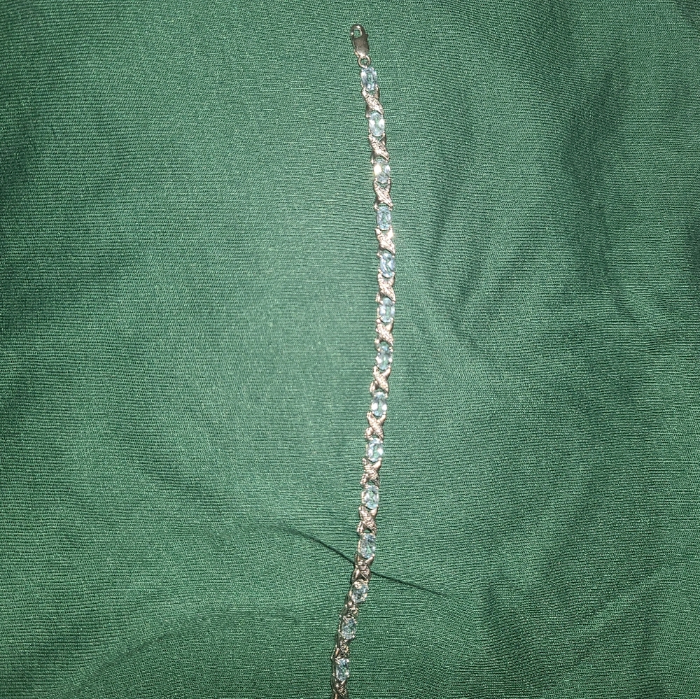 Sterling silver xo bracelet with cz aquamarine stones
